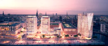 Westfield Überseequartier Einkaufszentrum beleuchtet bei Nacht.